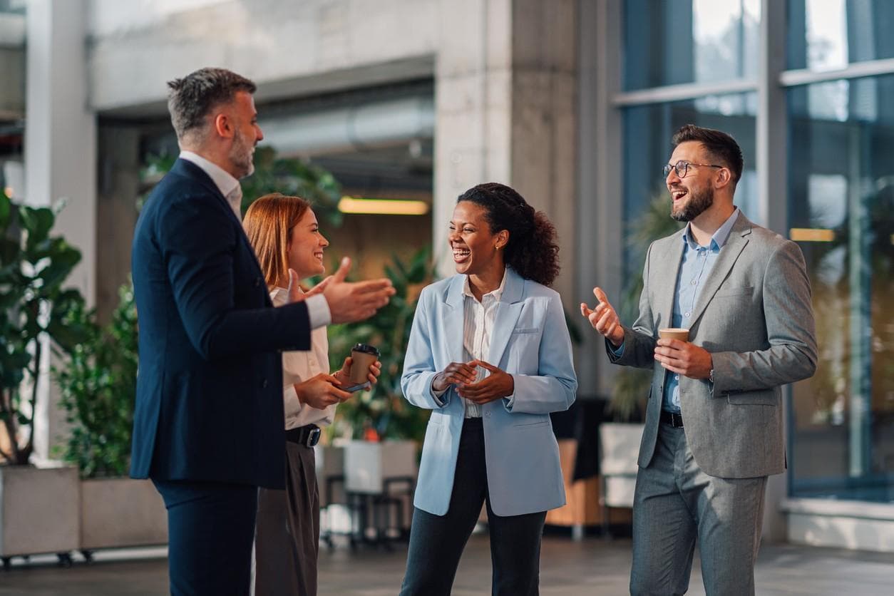 Members talking together at an alliance networking event