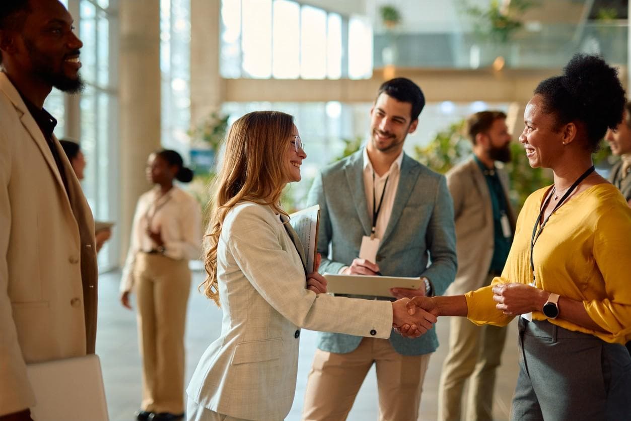 Alliance members meeting at a networking event